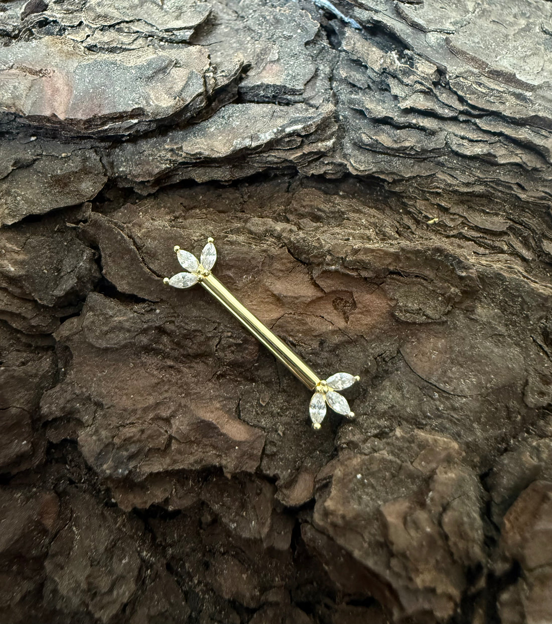 Golden Lotus Nipple Piercing