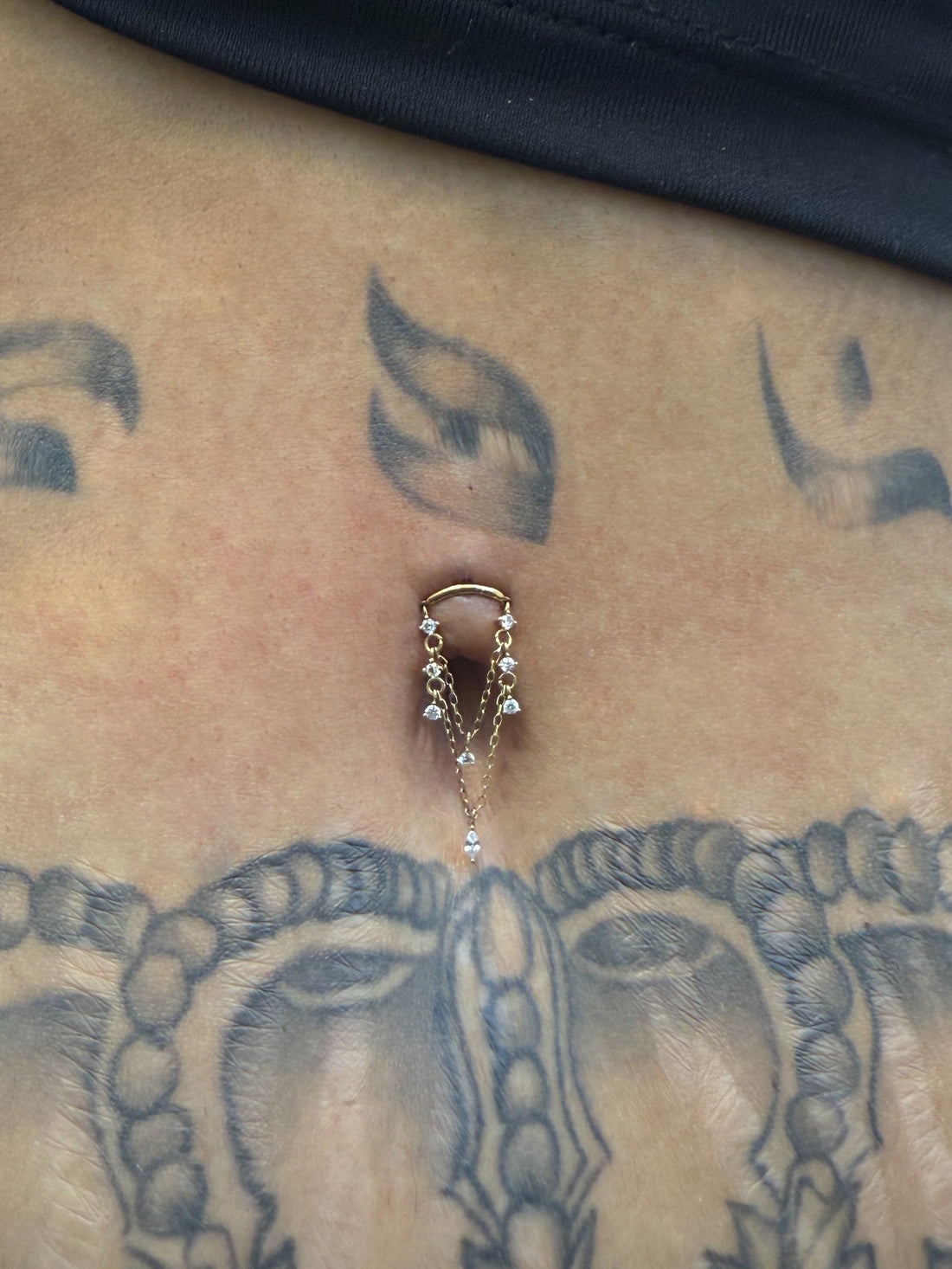 Gold Stellar Drape Dermal Top