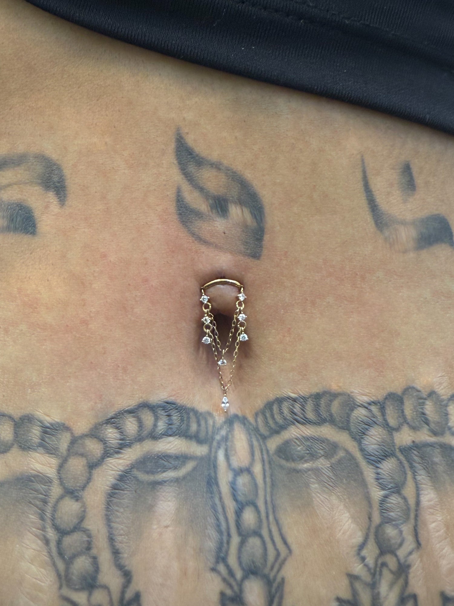 Gold Stellar Drape Dermal Top