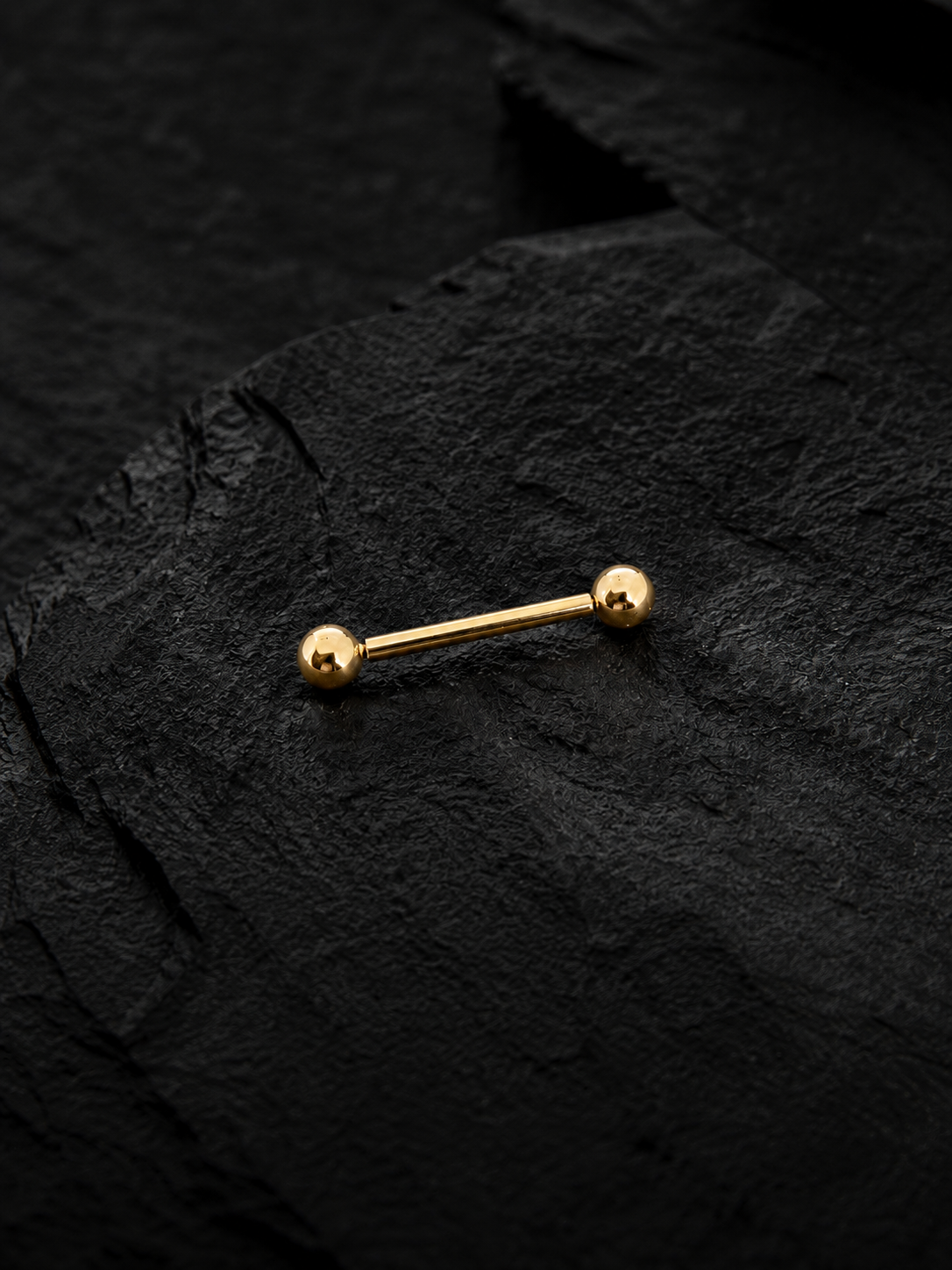 Solid gold nipple/tongue piercing